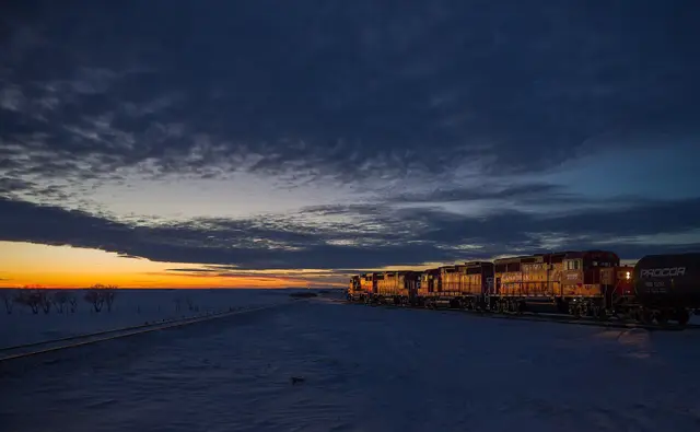 CP locomotives at dusk on the winter prairie